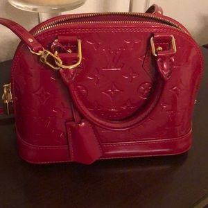 Louis Vuitton alma in size BB color “cherry”